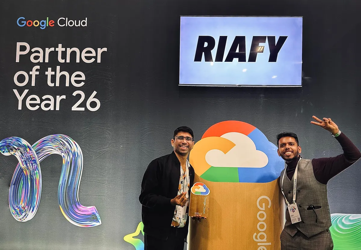 Riafy CEO John Mathew and COO Neeraj Mahoharan receiving the Google Partner of the Year Award in the Social Impact: Accessibility Innovation category at Google Cloud Next in Las Vegas.